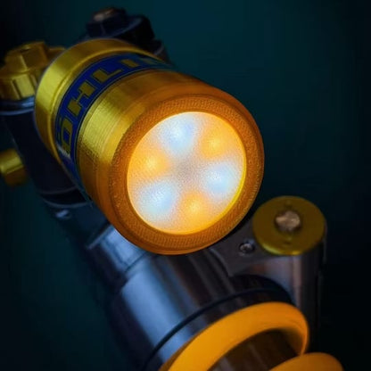 Justerbar støddæmper med LED-lampe